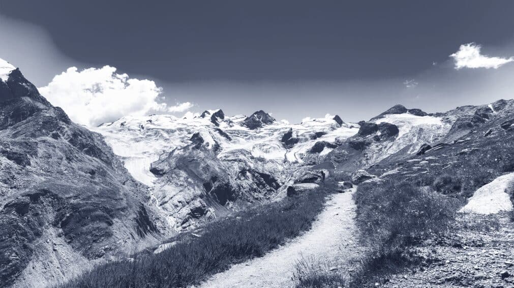 A hiking trail winding through the Swiss Alps