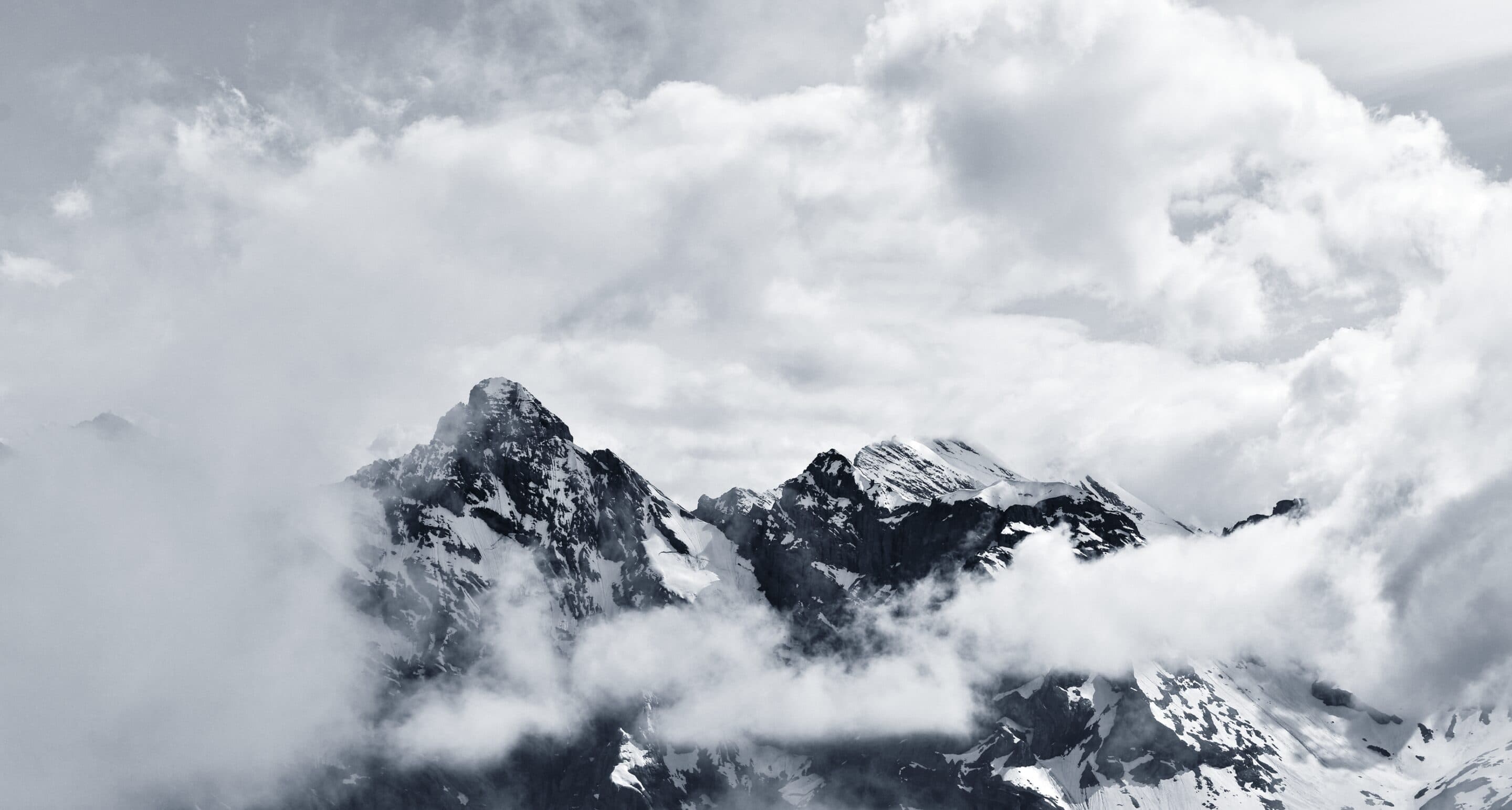 Mist over a mountain range at dawn
